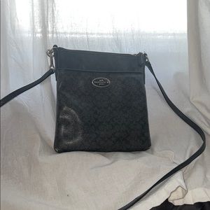 COPY - Black cross body coach purse.